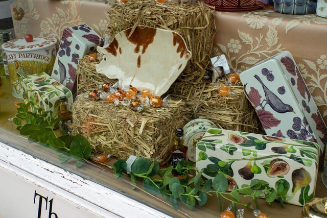 The Steyning Florist, sister shop to The Little Sweetshop, had a wonderful display, including a piggy dish on bales of straw. This window was not an official entry but judges felt it worthy of a mention