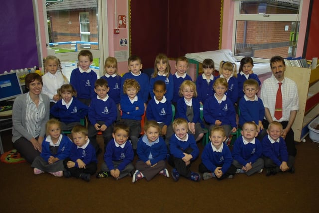 Kirton Primary's RM class, teaching assistant Tracy Frankish and class teacher Adrian Malsher.