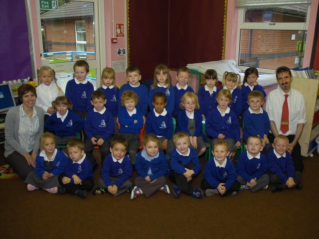 Kirton Primary's RM class, teaching assistant Tracy Frankish and class teacher Adrian Malsher.