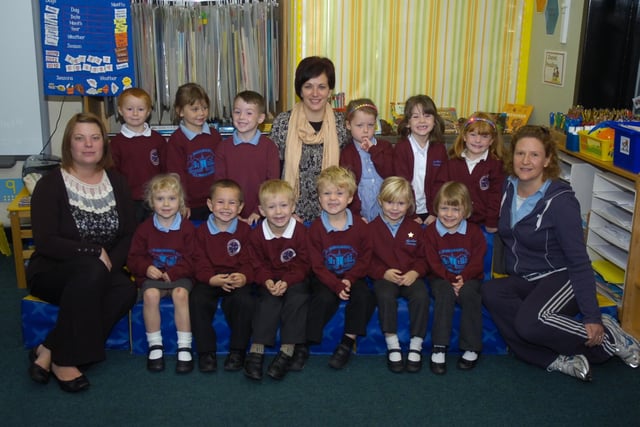 Pupils are pictured with (from left) class teacher Becky Smith, teaching assistant  Nicky File, and class teacher Natalie Wallis.