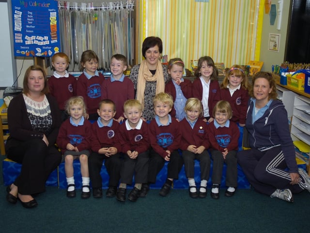 Pupils are pictured with (from left) class teacher Becky Smith, teaching assistant Nicky File, and class teacher Natalie Wallis.