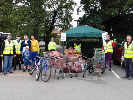 Some of the 'litter heroes' with rubbish collected during the litter pick