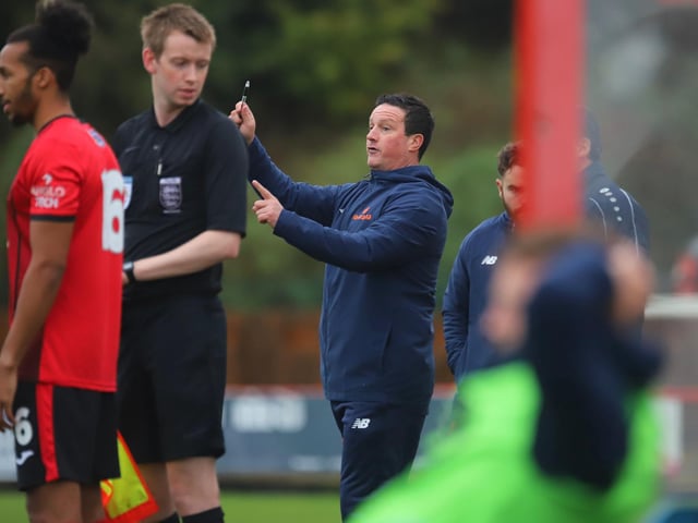 Paul Cox gives out some instructions as the returning Lewis Wilson prepares to enter the fray