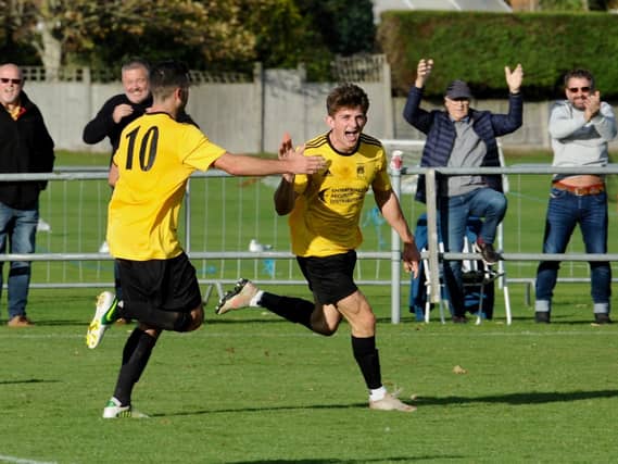 Lucas Pattenden celebrates his equaliser