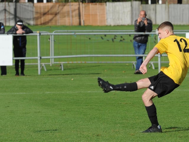 Dave Herbert scores from the spot