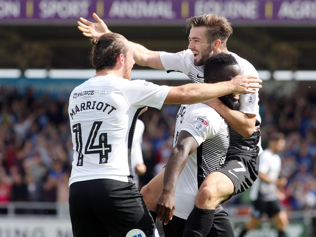 Posh outclassed Northampton to win 4-1 in a League One fixture at Sixfields in 2017. Gwion Edwards is pictured jumping for joy after opening the scoring. Photo: Joe Dent/theposh.com.
