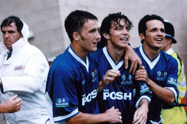 Simon Davies (centre) celebrates his winning goal at Northampton in 1999 with Adam Drury (left) and Matthew Etherington.