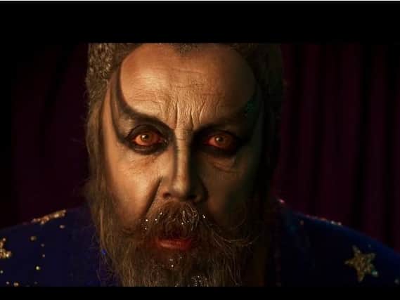 Alan Moore will play a key role in the film. In the trailer, Moore - dressed mysteriously like The Moon - leans in and whispers: 'We've saved you the best seats in the house.'