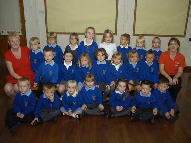 Pictured with pupils (from left) class teacher Caroline Corcoran and teaching assistant Jane Robinson.
