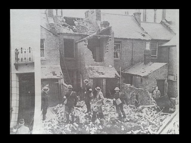 ARP wardens inspecting the damage at Ranelagh Terrace, Leamington, August 1940.