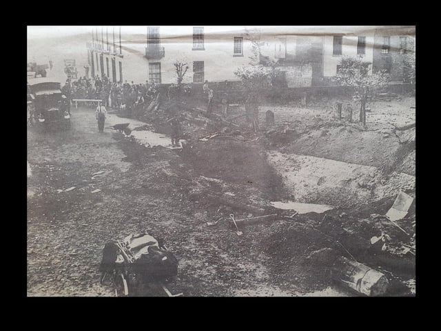 A bomber crater near the parish church, Leamington, October 1940, which caused considerable damage and one fatality.