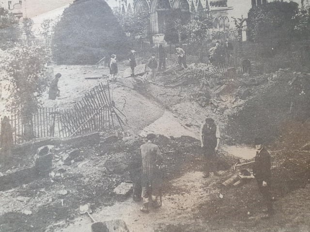 A bomber crater near the parish church, Leamington, October 1940, which caused considerable damage and one fatality.