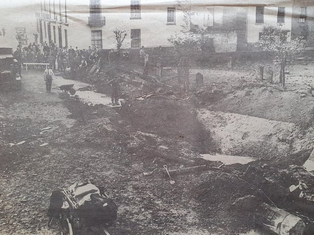 A bomber crater near the parish church, Leamington, October 1940, which caused considerable damage and one fatality.