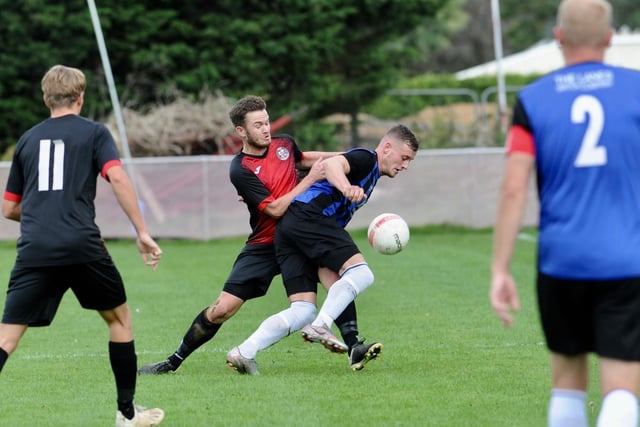 Action as Wick take on Saltdean at Crabtree Park / Picture: Stephen Goodger
