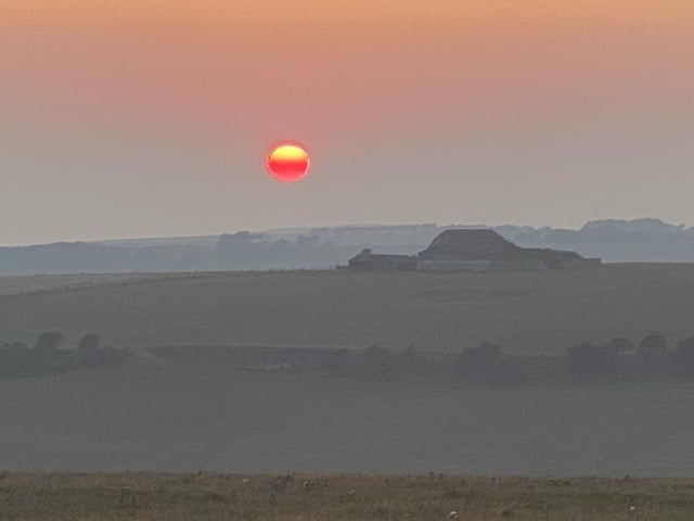 Melanie Wells took this sunset on the Beachy Head Road on September 22. "I was driving towards Eastbourne and noticed the sun in my rear view mirror, so I pulled into the lay-by on Beachy Head Road and dashed back onto the higher verge. It was magnificent with the foreground looking hazy. Taken on my iPhone Pro Max," she said. SUS-201014-100422001