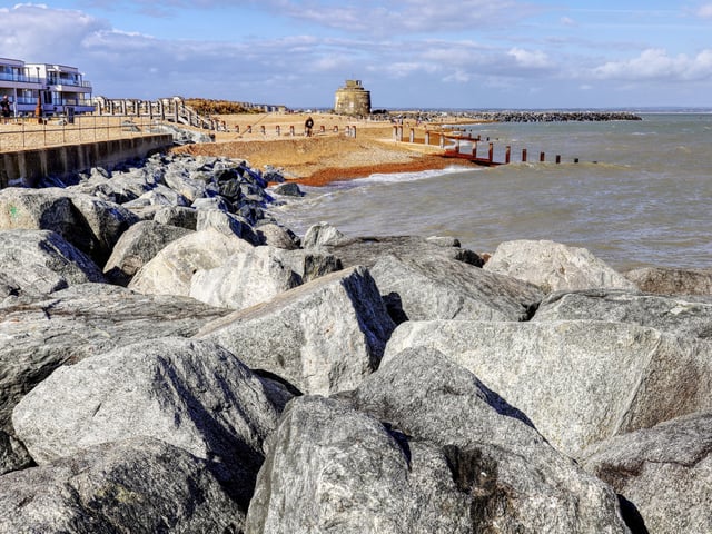 Heavy sea defences looking towards the Martello tower and Sovereign Harbour. Taken by David Ford with a Canon 6D II. SUS-201014-101838001