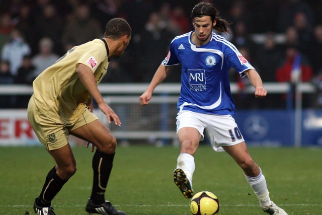 George showing off his fancy footwork in a League One game against Tranmere in 2008. Posh owner Darragh MacAnthony’s company MRI were the shirt sponsors.