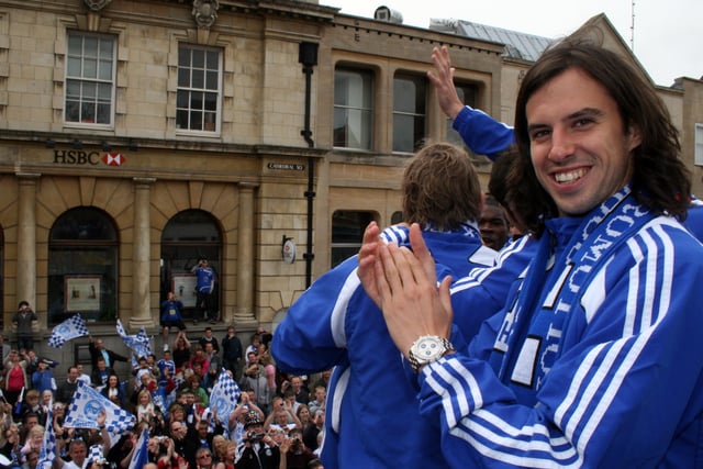 In May, 2009, Posh were given an open-top bus parade around the city after securing a second promotion in successive seasons. Here George is applauding the thousands of Posh fans who lined the route.