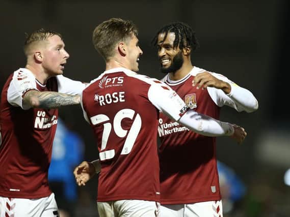 Danny's delight: Rose is off the mark for the Cobblers. Pictures: Pete Norton.