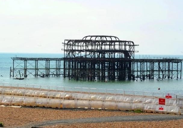 West Pier, Brighton: a phantom dog is said to roam the beach, following walkers before vanishing into thin air. And a Victorian figure has been seen on the promenade before disappearing into the mist.