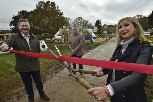 Opening the new play area at Sacrewell Farm , Cllr Steve Allen,  Jane Scriven, Chair of Trustees at the Farm and General manager Lee Scowen EMN-201023-180028009