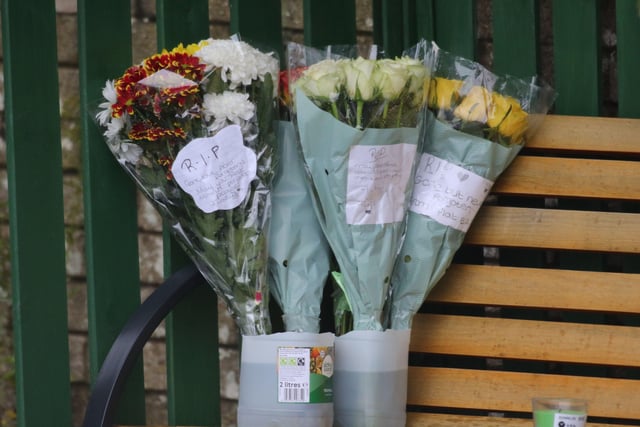 Flowers have been left at the scene of the fatal stabbing
