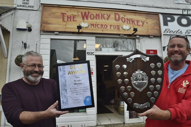 Dave and Andy Williams of the Wonky Donkey with their CAMRA award EMN-200210-180911009