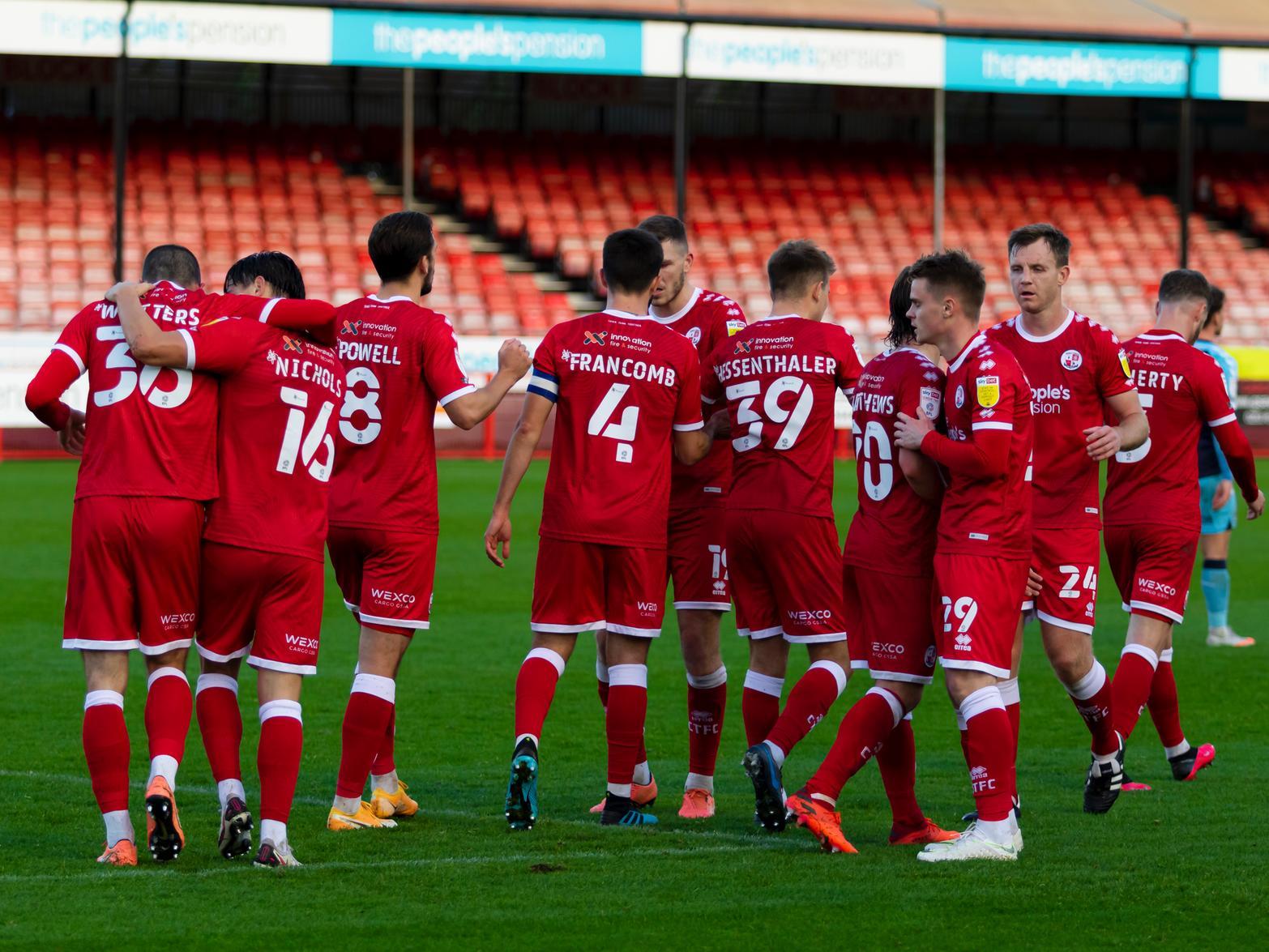 Crawley Town players celebrate Max Watters' goal