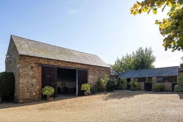 There is a range of stables and outbuildings in various states of repair with a stone detached barn currently used as a feed store.
