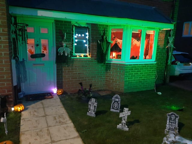 This house, bathed in an eery green glow, no doubt attracted a lot of attention!