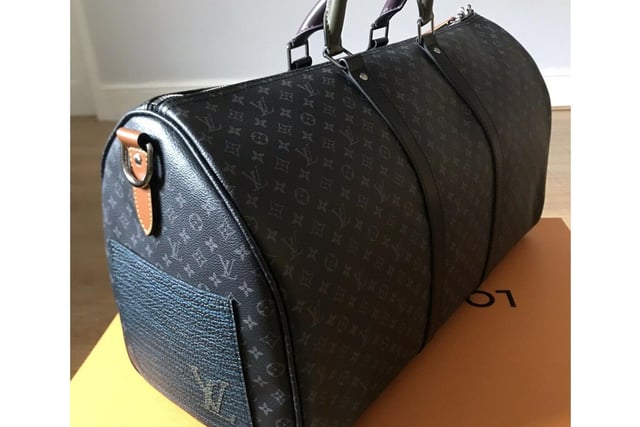 It's a handbag to those without a keen eye for designer gear. It's a Limited Edition Virgil Abloh Patchwork Collection M56855 Keepall Bandouliere 50 to those with and with bids already over £1,000. Current bid: £1,020.00. Ends: 10 Nov, 2020: