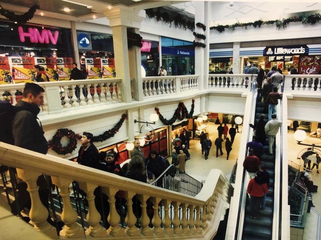 Shoppers doing some Christmas buying inside The Grosvenor Centre back in the `nineties. Do you remember Littlewoods. ©️ Chronicle & Echo.