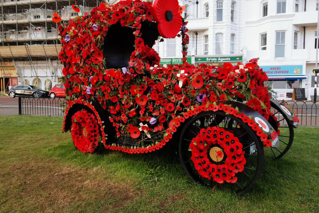 Remembrance Sunday in Bexhill, East Sussex, where a poppy car has delighted onlookers. Picture: Andrew J Crotty