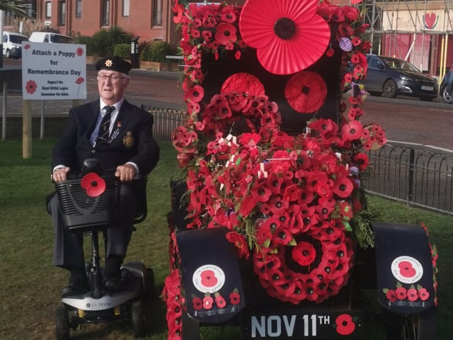 Remembrance Sunday in Bexhill, East Sussex, where a poppy car has delighted onlookers. Picture: Andrew J Crotty