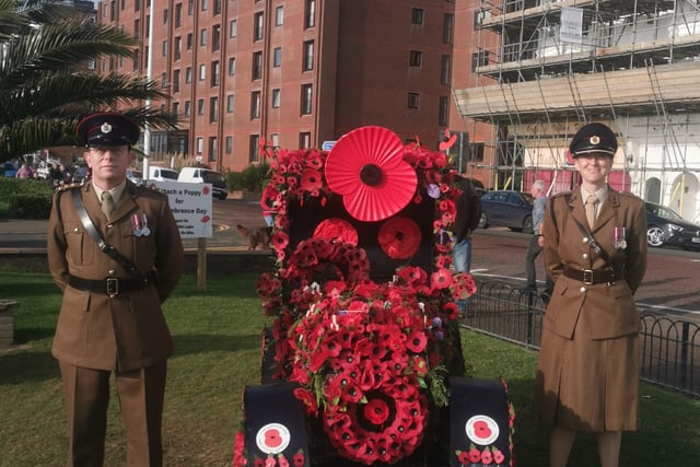 Remembrance Sunday in Bexhill, East Sussex, where a poppy car has delighted onlookers. Picture: Andrew J Crotty