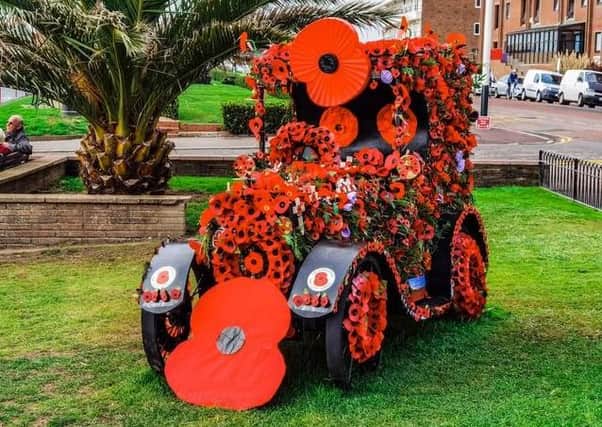 Remembrance Sunday in Bexhill, East Sussex, where a poppy car has delighted onlookers. Picture: ADR Photography