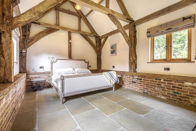 The house provides stunning and well-arranged accommodation over two floors and includes a wealth of exposed timberwork, including an elm staircase, oak and elm doors