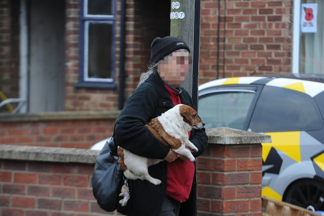 A dog was seen being rescued from the house