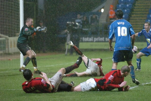 Jan 2008, Posh 8, Accrington Stanley 2, League Two. A spectacular attacking display in the rain (pictured). Hat-tricks for Aaron Mclean and George Boyd and two goals for Craig Mackail-Smith as the Holy Trinity ran riot.