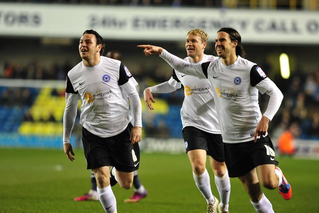 February, 2013, Millwall 1, Posh 5, Championship. Posh were magnificent at the New Den as their charge to survival gathered pace. Tomlin (2), Rowe, Mendez-Laing and Boyd scored the goals. It was Boyd's last game for the club as he joined promotion-bound Hull later that week. The players are pictured celebrating a Tomlin (left) goal.