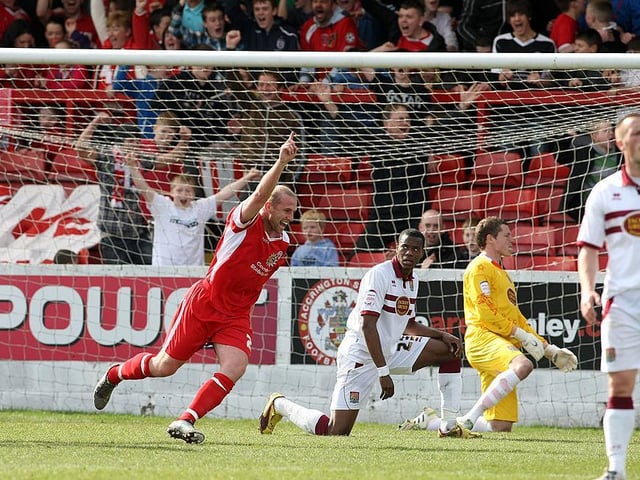 Michael Jacobs (67) was on target, but by then Gary Johnson's Town were already 3-0 down