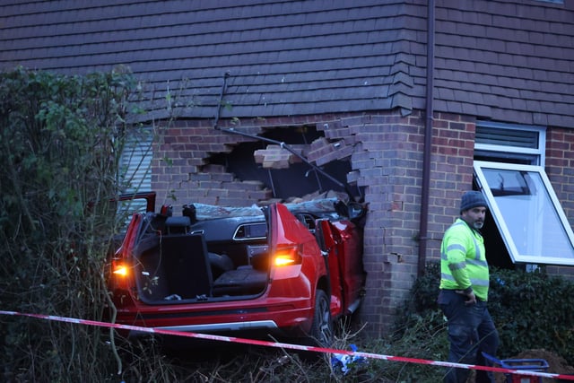 A car has ploughed into a house in Crawley