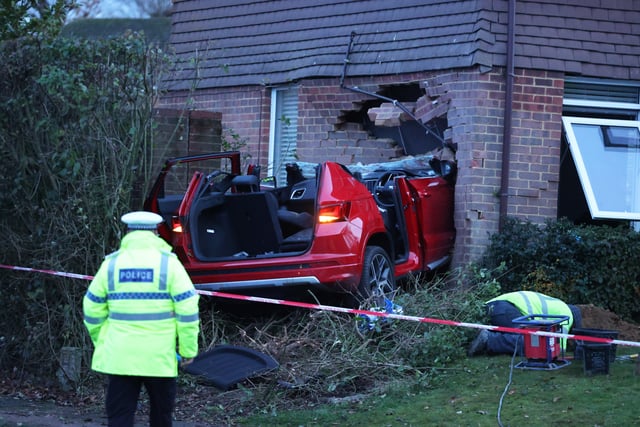 A car has ploughed into a house in Crawley