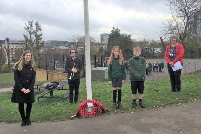 Poppy wreaths were placed at the base of the flagpole by Miss Wellbelove, Co-Headteacher and the oldest and youngest members of the Year 6 cohort