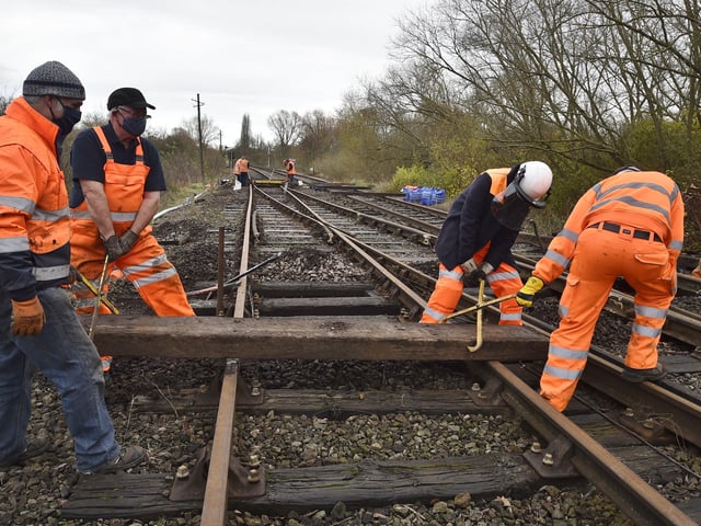 Nene Valley railway track repair near  Orton Mere station by NVR  volunteers. EMN-201116-142041009