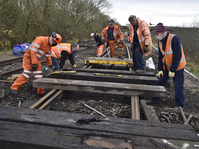 Nene Valley railway track repair near  Orton Mere station by NVR  volunteers. EMN-201116-142054009