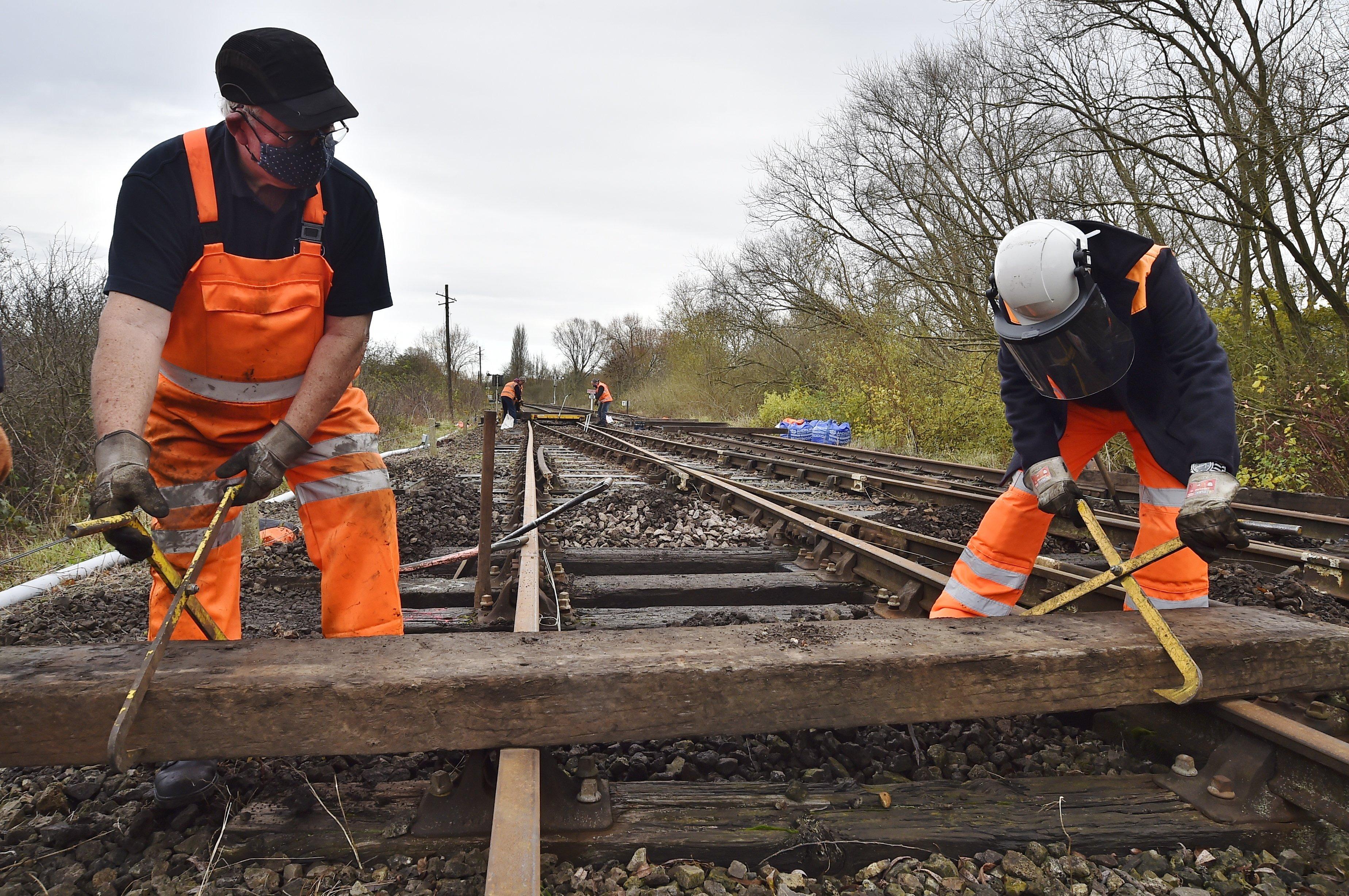Nene Valley railway track repair near  Orton Mere station by NVR  volunteers. EMN-201116-142029009