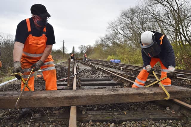 Nene Valley railway track repair near Orton Mere station by NVR volunteers. EMN-201116-142029009