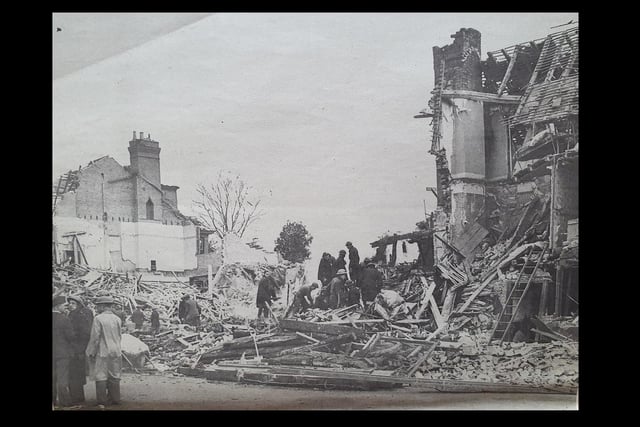The devastation in The Square, Kenilworth, November 1940, after a landmine was dropped from an enemy aircraft, with a large loss of life.