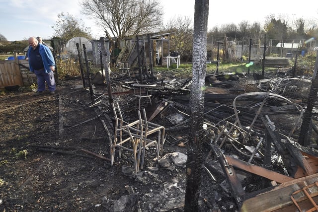 Association chairman Bob Morton joined Fane Road allotment holders to look at the damage caused after fires destroyed several sheds while others were broken into. Pictures David Lowndes.